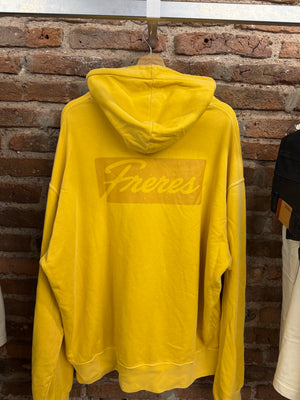 Feria · Buzo amarillo