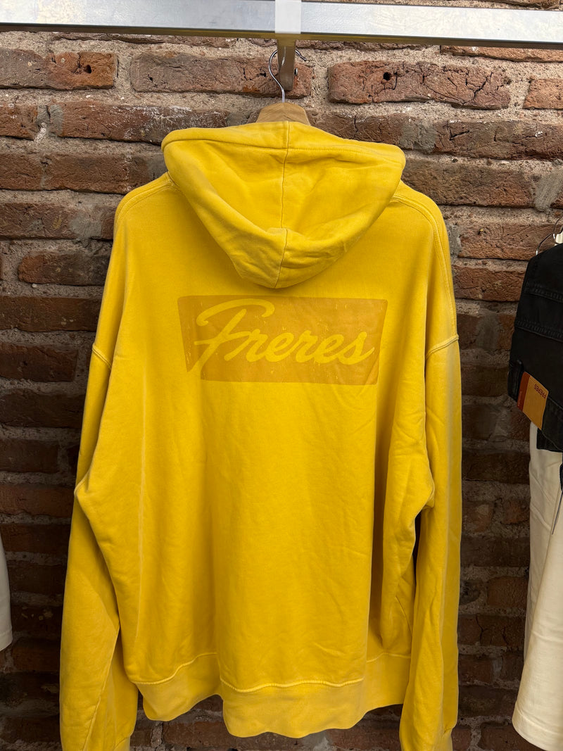 Feria · Buzo amarillo