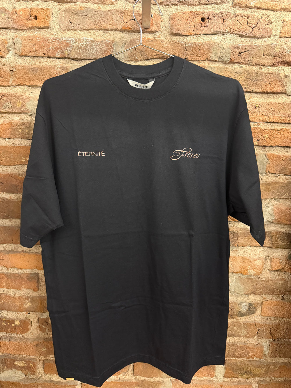 Feria · Remera over Social Club negra
